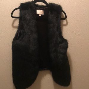 Black faux fur vest